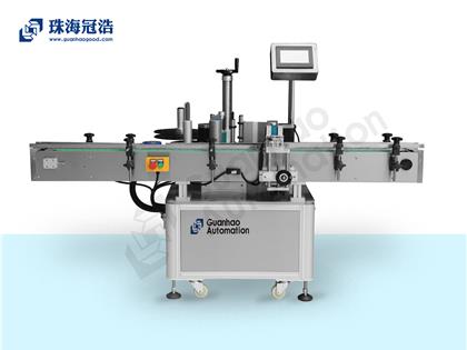 全自動(dòng)圓瓶定位貼標機